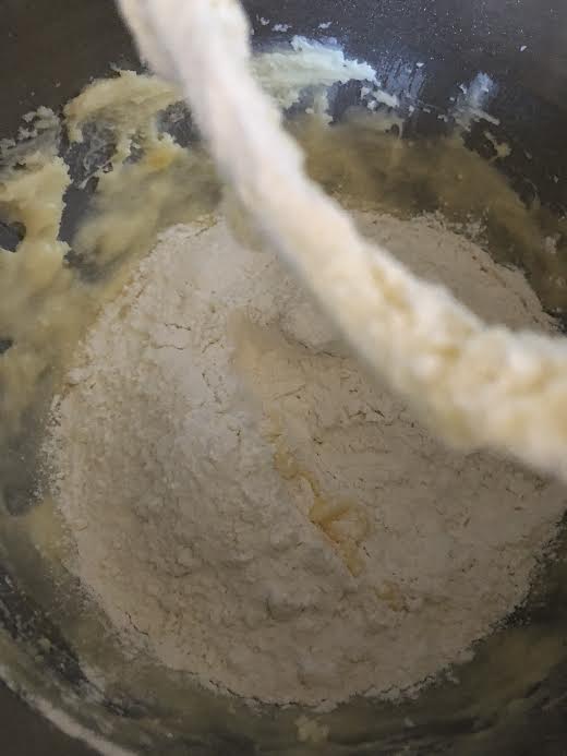 Flour added to batter on bowl