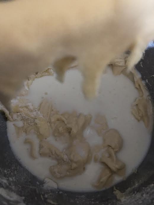 Milk added to batter in bowl