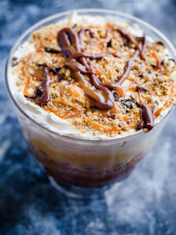 Banoffee Trifle in a glass trifle bowl showing layers
