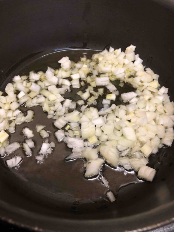 Onions in oil in pot
