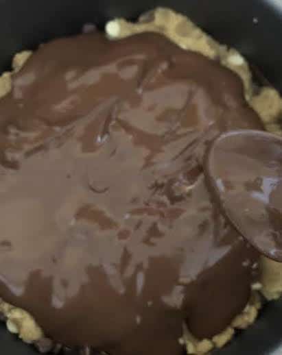Nutella spread on cookie dough layer