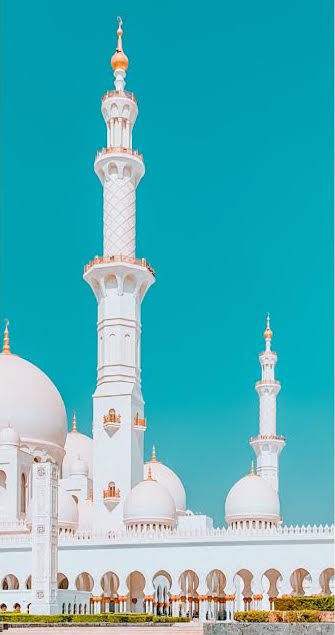 White mosque against blue sky