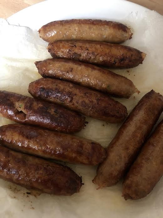 Sausages on a lined plate