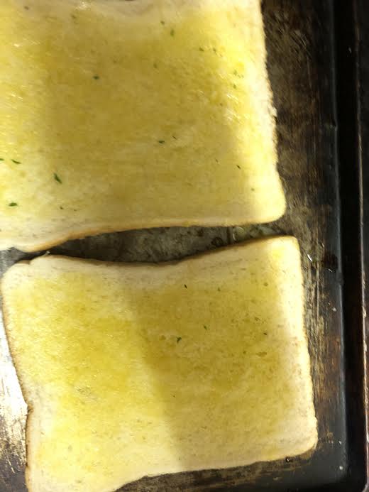 Buttered toast on tray 