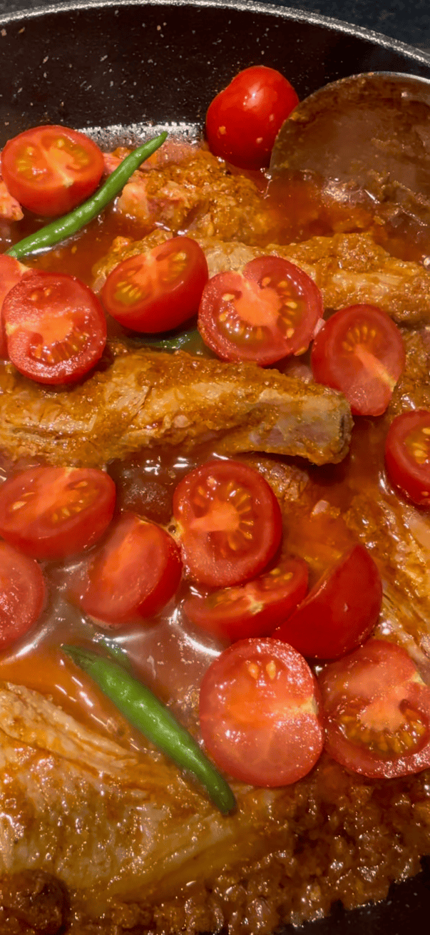 Lamb Chops Curry Tomatoes and Chillies added to pot