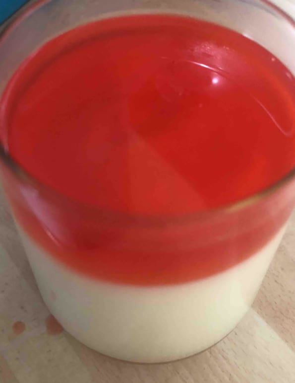Jelly poured on top of milk pudding