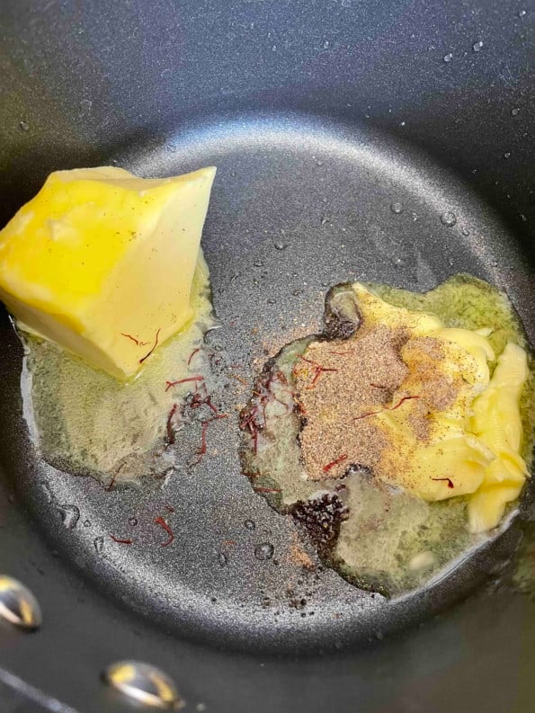 Butter, Cardamom and Saffron in pot