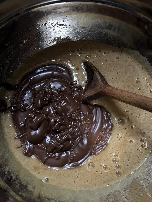 Nutella being stirred into batter in bowl