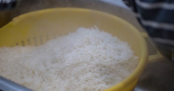 Rice strained in colander