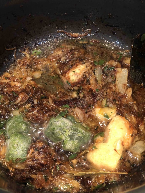 Garlic, Ginger and Green Chilli added to browned onions in pot