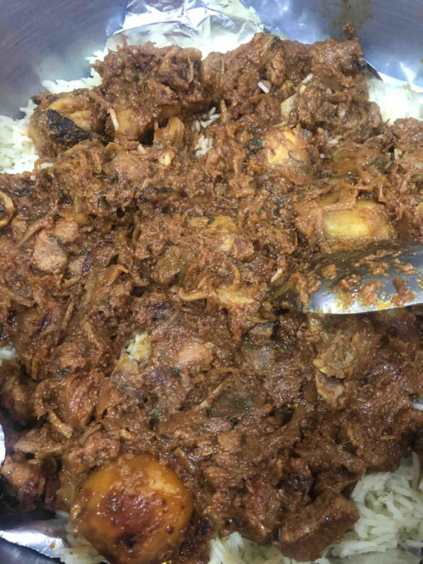 Lamb added on top of rice layer