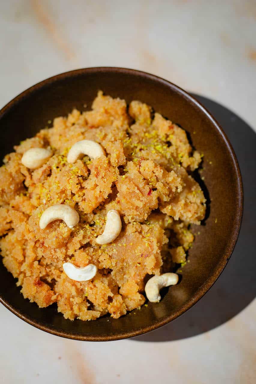 Soji Halva in bowl topped with Nuts