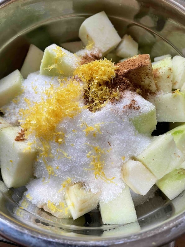 Apples, Sugar, Zest and Spices in bowl