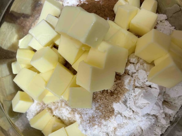 Cold cubed butter added to Flour mix in bowl