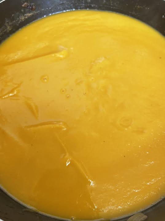 Smooth blended Pumpkin Soup in pot
