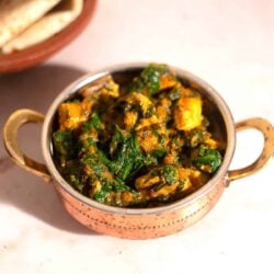 Palak Chicken and Rice on table
