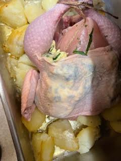 Chicken added to Potatoes in tin