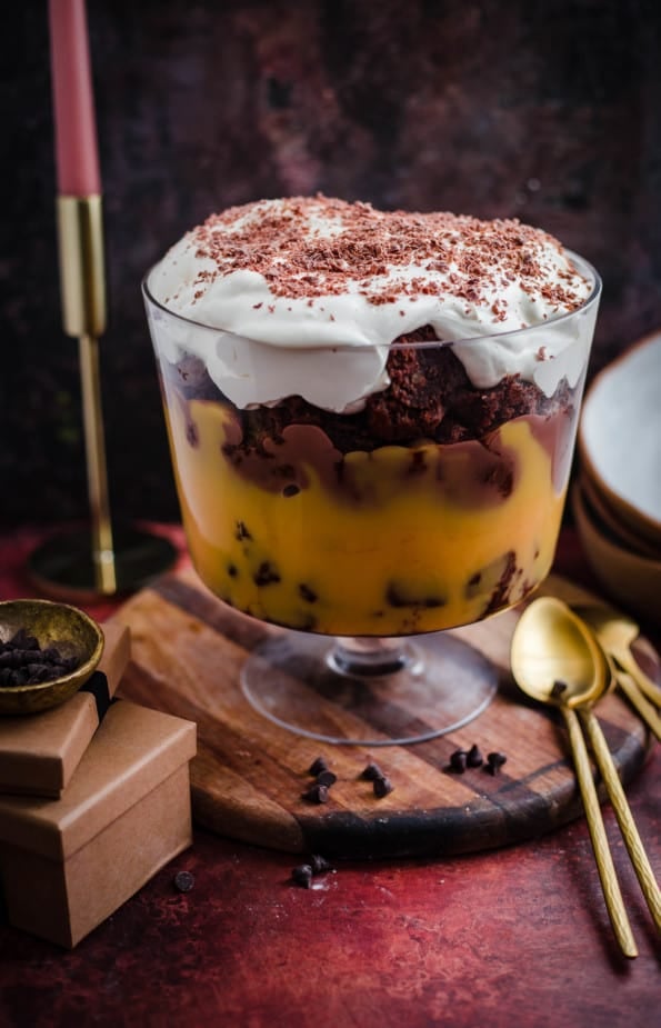 Brownie Trifle in large dish with candle and spoons to side 