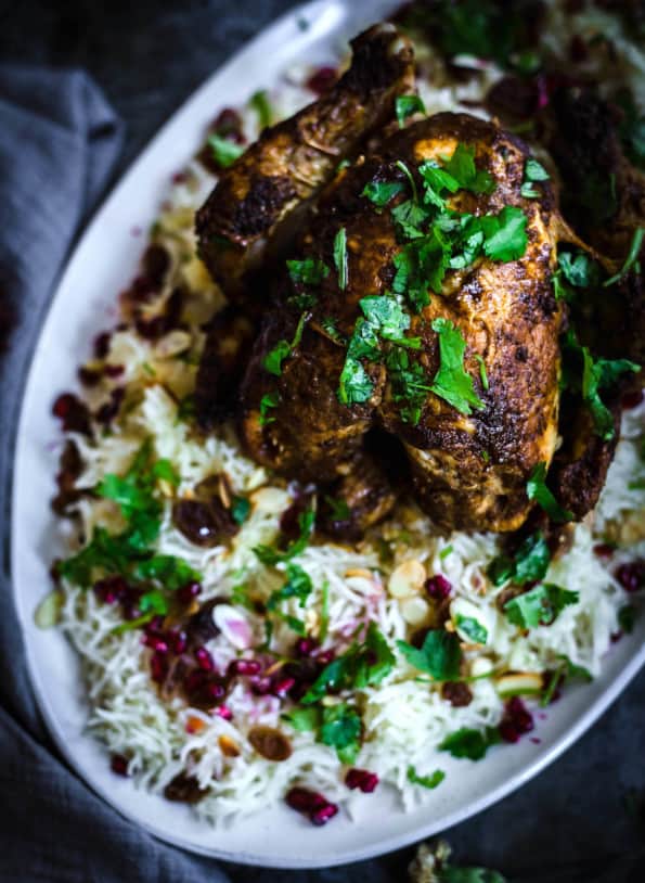 Jewelled Rice or Pilaf with a roast chicken on top