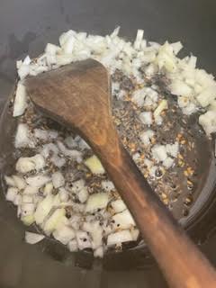 Diced onions added to pot