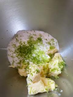 Lime zest, butter and sugar in bowl