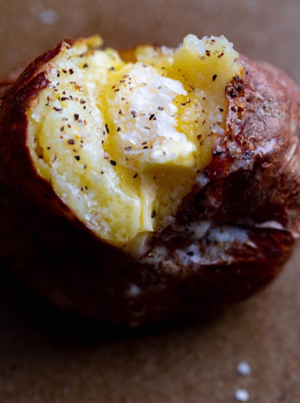 Baked Potato split with butter and salt and pepper