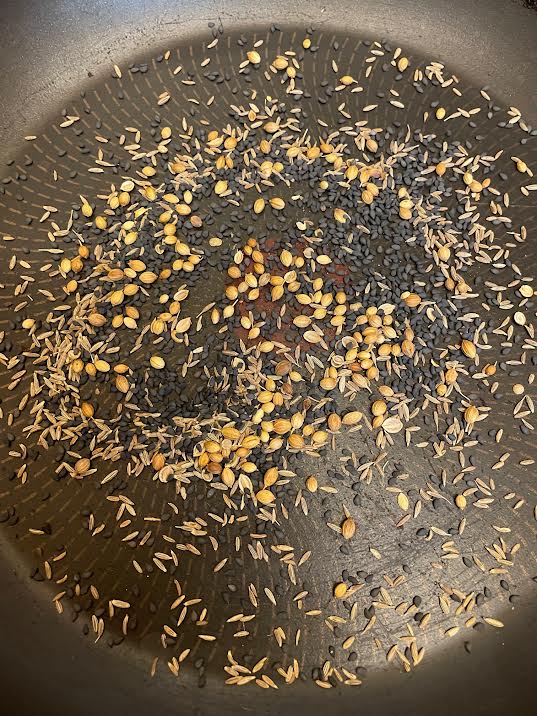 Coriander, Cumin and Sesame seeds in a pan