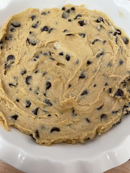 Cookie dough spread in microwave dish