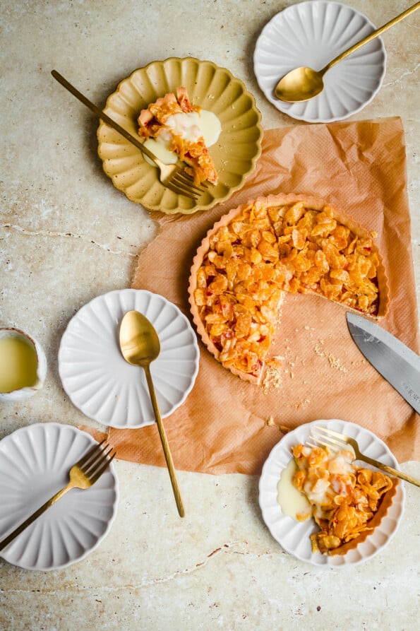 Cornflake Tart with serving plates and spoons