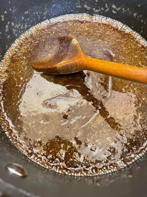 Melted toffee ingredients in pot
