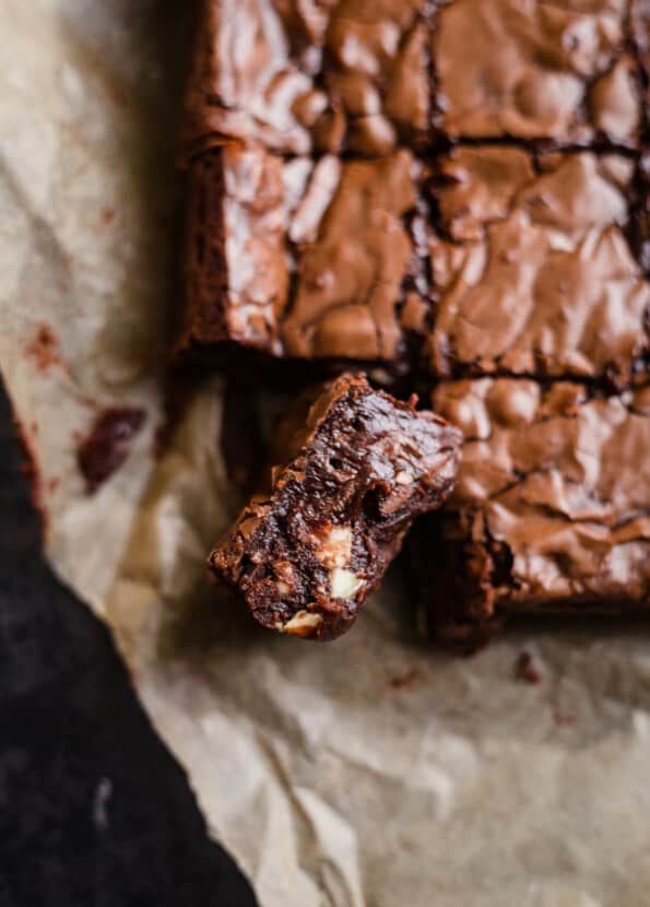 EASY FUDGY Triple Chocolate Brownies with one slice cut out