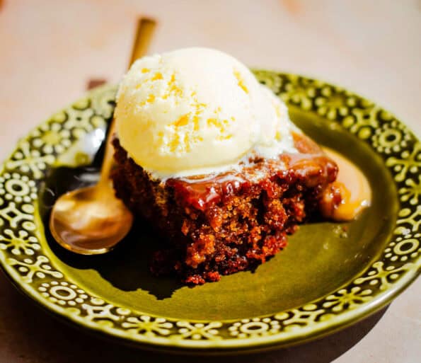 Sticky Toffee Pudding with ice cream in plate