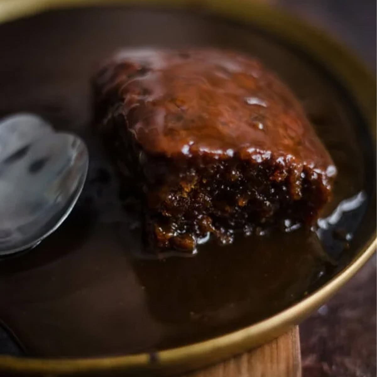 Sticky toffee pudding in plate