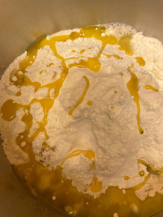 Oil added to bowl of flour