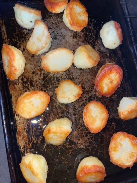 Potatoes in oven tray