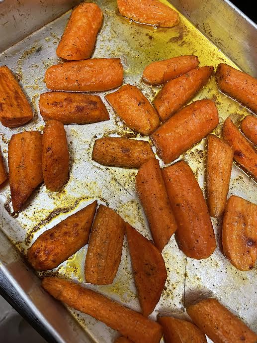 Caramalised carrots cooking in tin