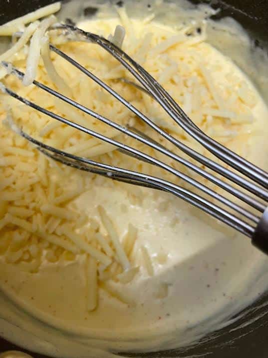 Cheese added to sauce