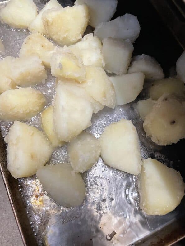 Potatoes added to tray