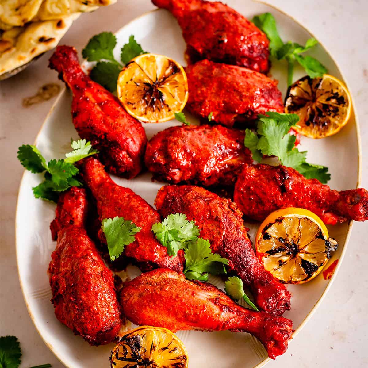 Easy Restaurant Style Oven Baked Tandoori Chicken Tandoori Chicken on platter