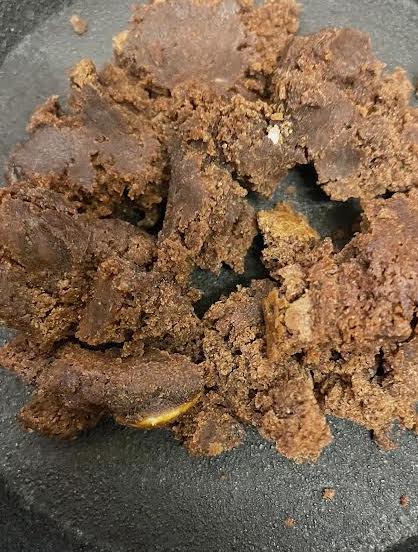 Crumbled Brownies in a cast iron pan