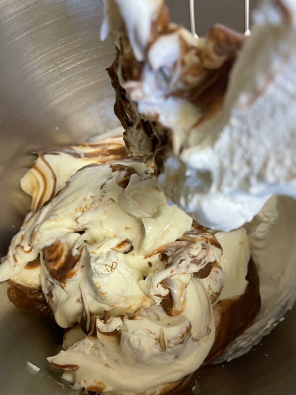 Chocolate and cream cheese mixture in stand mixer bowl