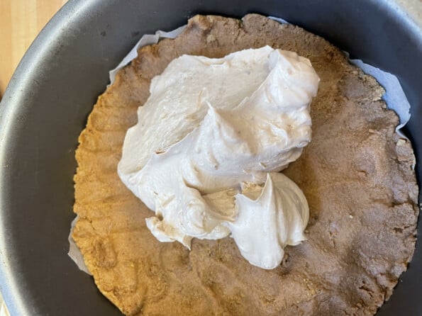 Cheesecake filling added to biscuit base