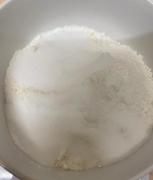 Plain Flour, Sugar and other dry ingredients in a bowl