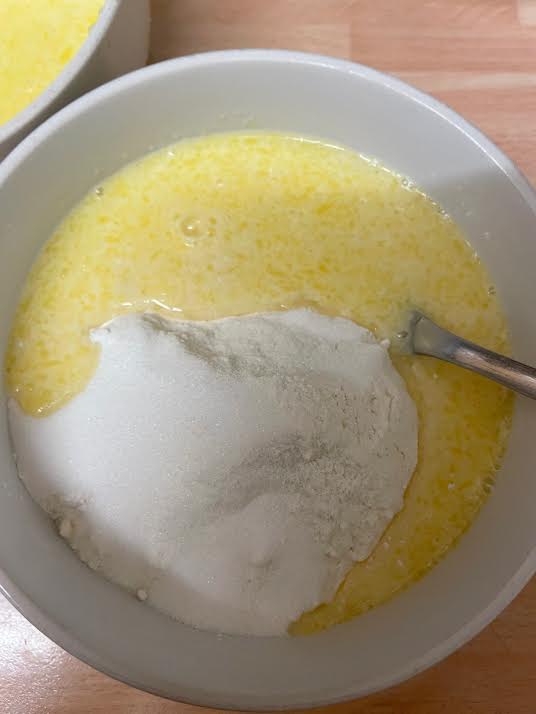 Wet and dry ingredients in a bowl
