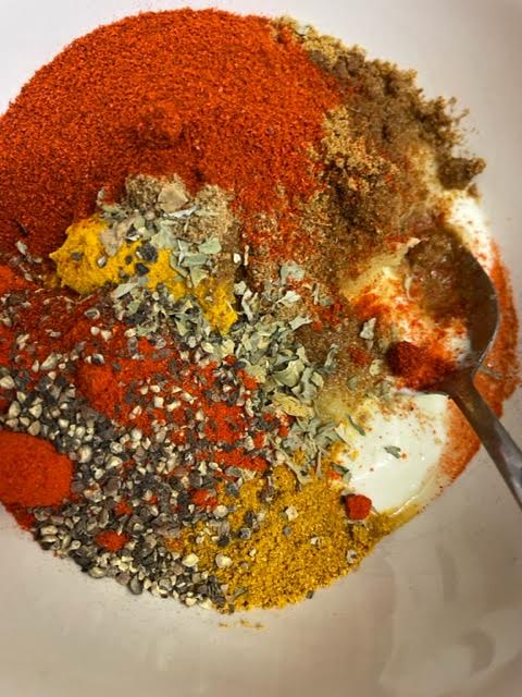 Chilli Powder added to marinade bowl
