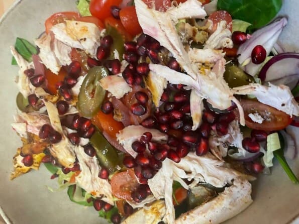 Pomegranate and Jalapenos added to bowl