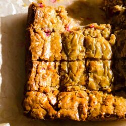 White Chocolate and Raspberry Blondies on baking paper