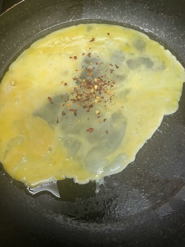 Scrambled eggs with chilli flakes