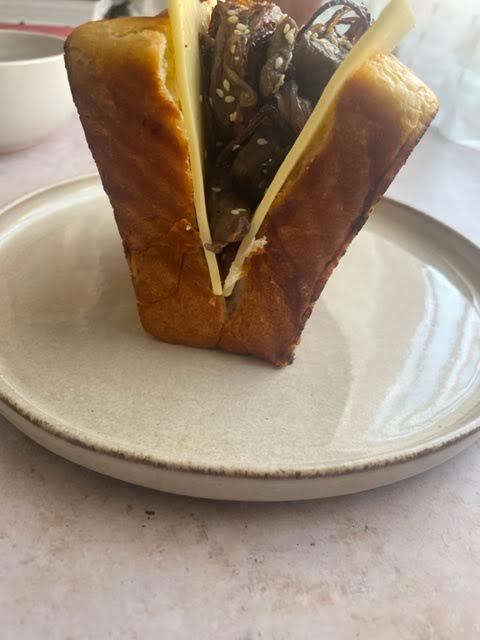 Beef and cheese in bread