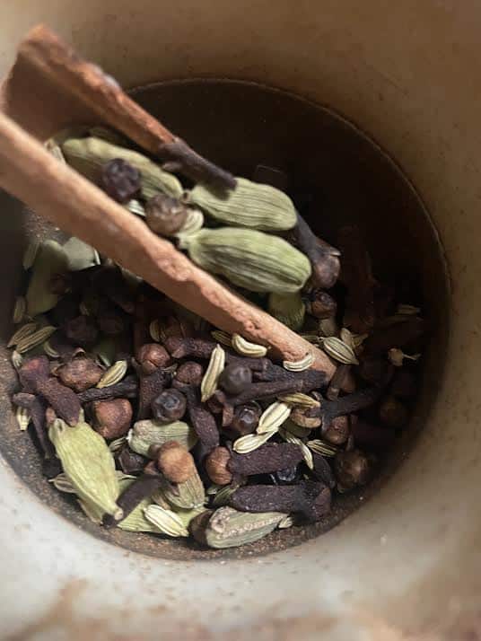 Chai spices in coffee grinder